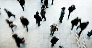 On overhead view of a group of people walking in a city.
